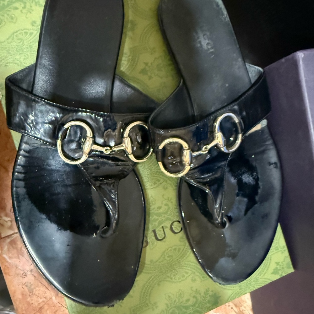 Gucci Black Flats with Elegant Metallic Embellishment